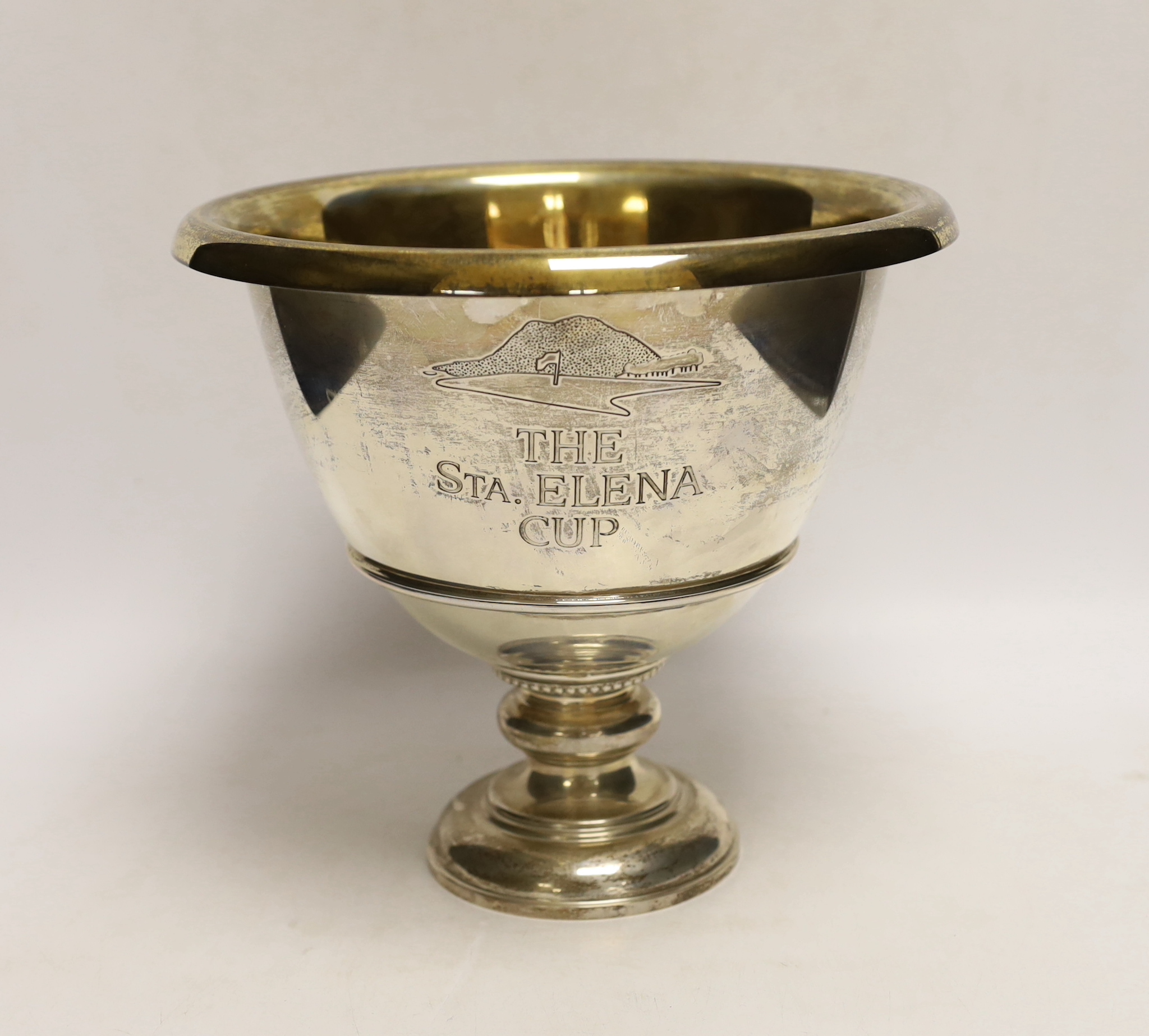 A Tiffany & Co sterling presentation pedestal trophy cup, with engraved inscription, 'The Sta. Elena Cup' and gilded interior, height 21.5cm, 39.1oz.